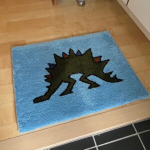 tufted dinosaur rug :stegosaurus