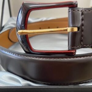 brown cordovan belt with lacquered buckle